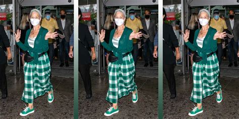 helen mirren wearing cariuma sneakers.